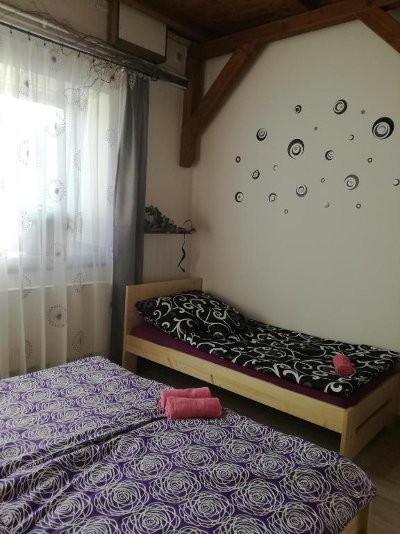 Postel nebo postele na pokoji v ubytování Apartmany Kras