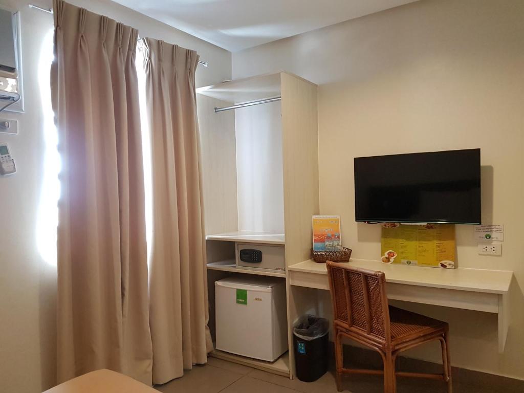 Kuchyň nebo kuchyňský kout v ubytování Cebu R Hotel Mabolo