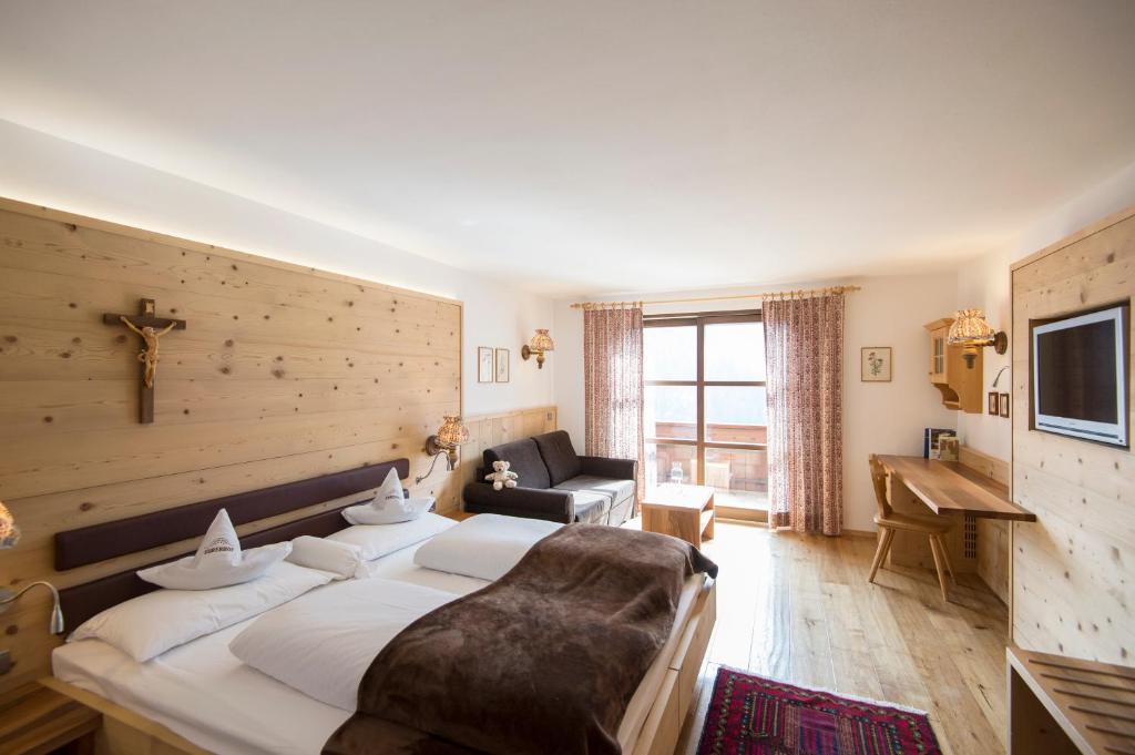 TV a/nebo společenská místnost v ubytování Charmehotel Uhrerhof - Deur
