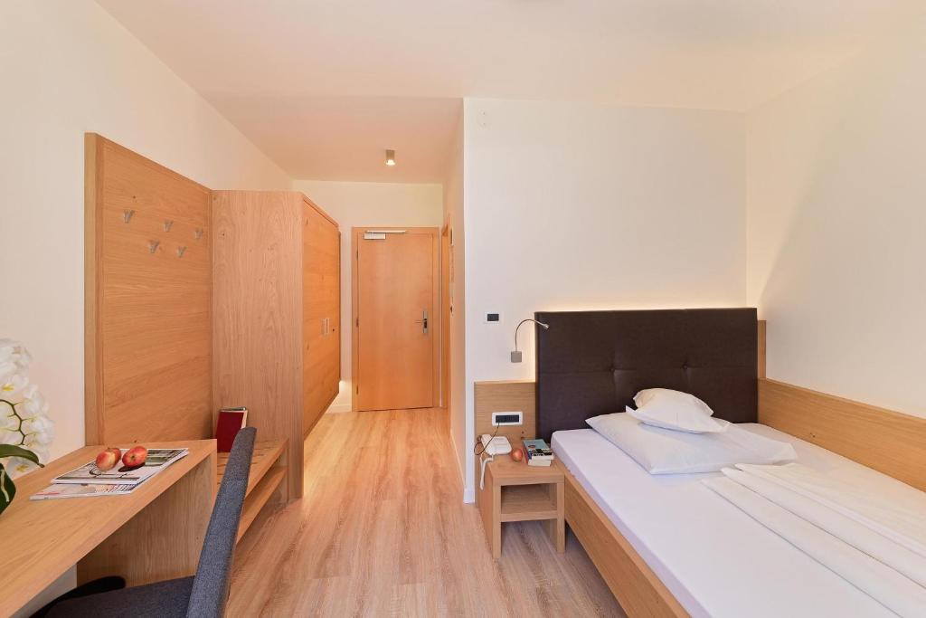 Postel nebo postele na pokoji v ubytování Hotel Rablanderhof
