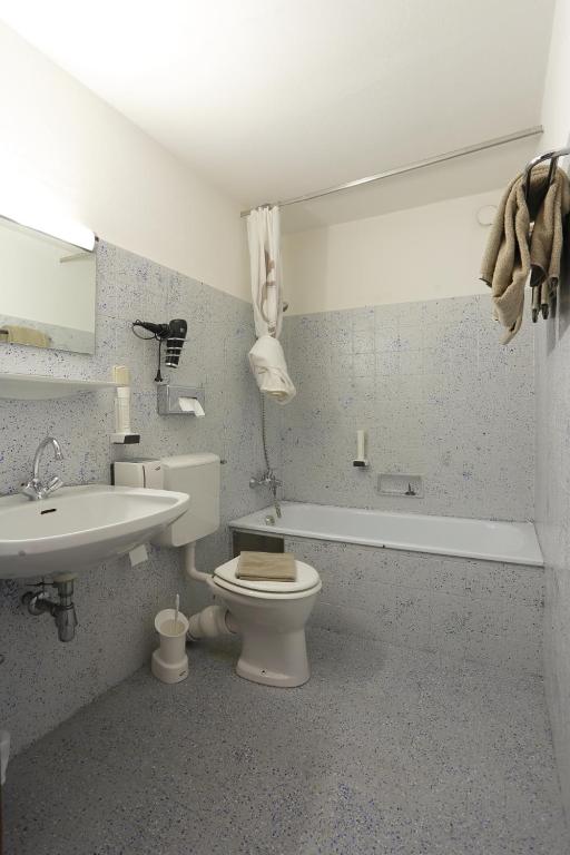 Koupelna v ubytování Alpen.Adria.Stadthotel