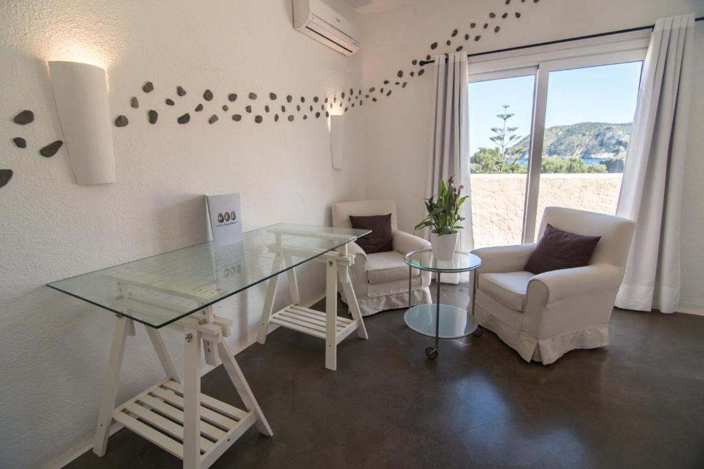 Posezení v ubytování Hotel Cala Joncols