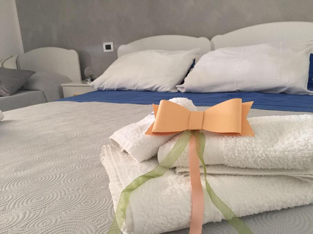 Postel nebo postele na pokoji v ubytování B&B Giorgio La Pira