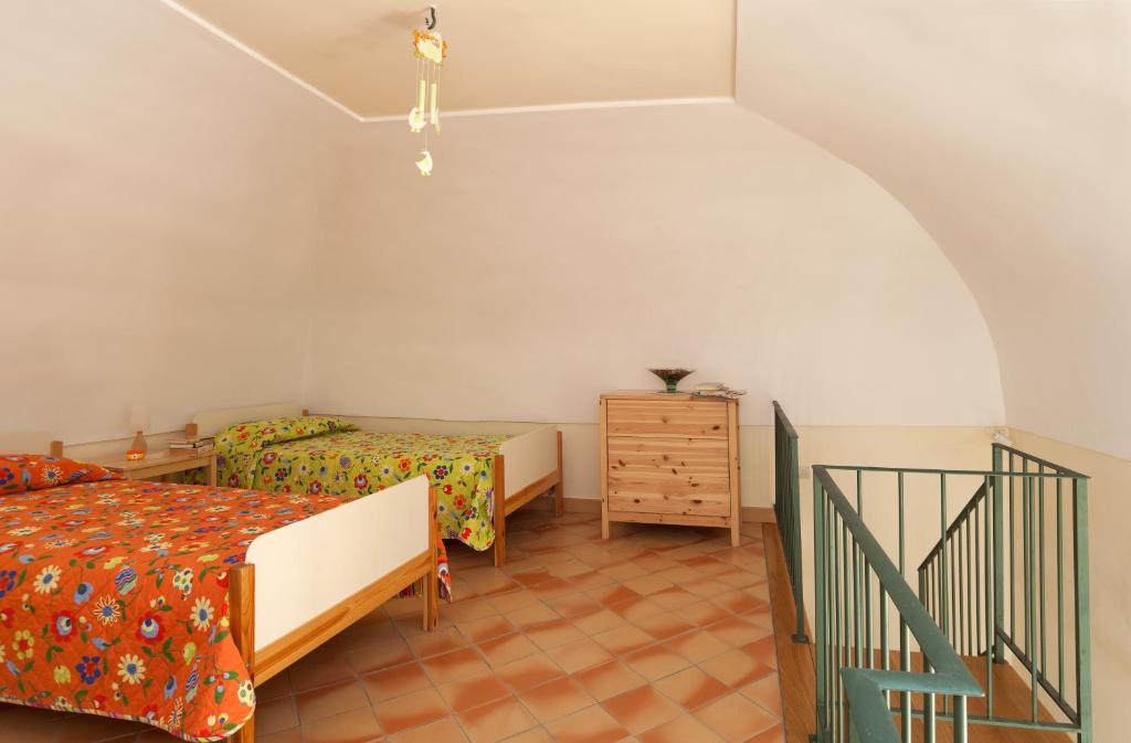 Postel nebo postele na pokoji v ubytování B&B Cassiopea