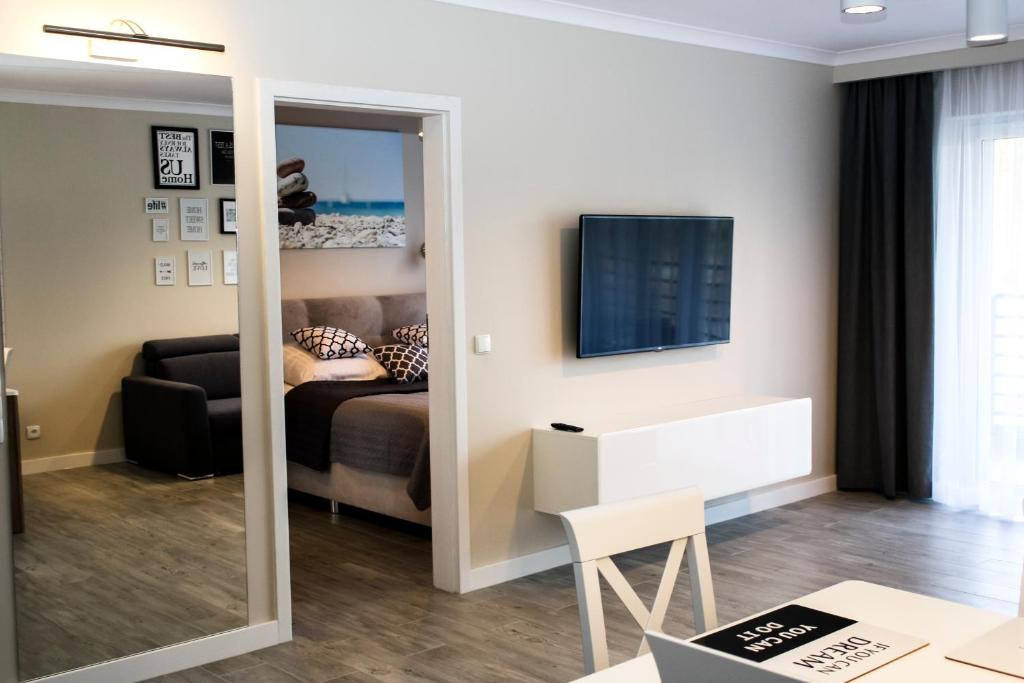 Posteľ alebo postele v izbe v ubytovaní Apartament Luxury