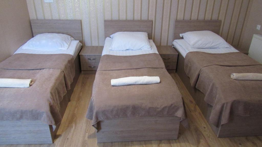 Postel nebo postele na pokoji v ubytování Guest House on V. Pshavela 50