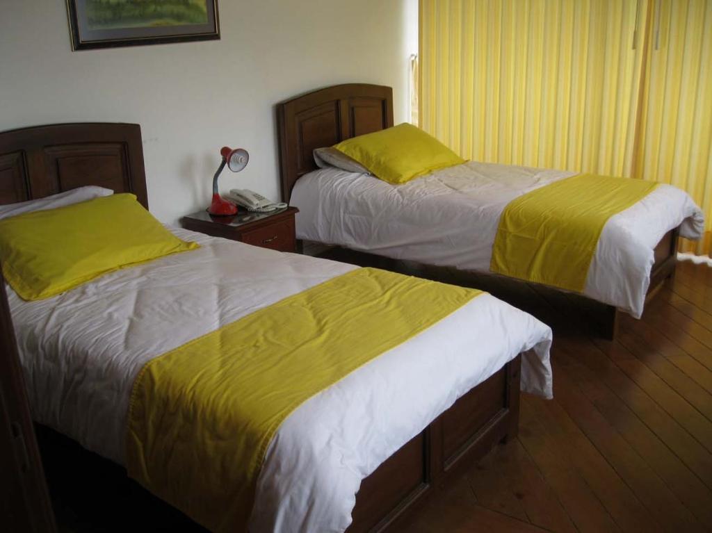Postel nebo postele na pokoji v ubytování Hotel Rincón Escandinavo