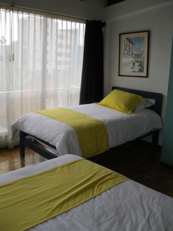 Postel nebo postele na pokoji v ubytování Hotel Rincón Escandinavo