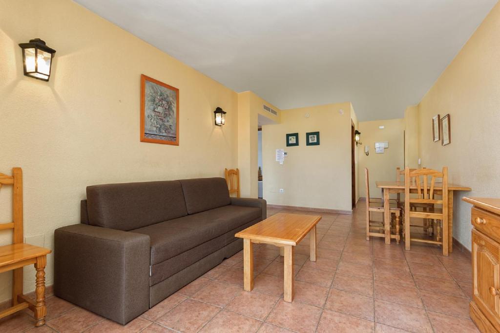 Posedenie v ubytovaní Apartamentos Embajador