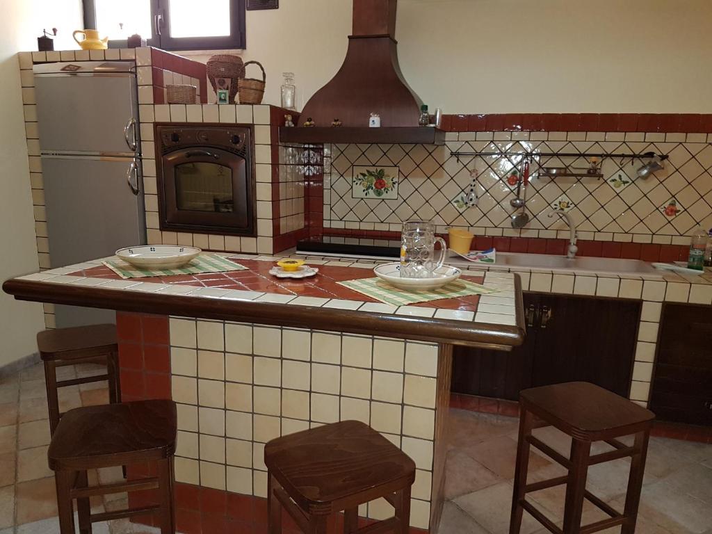 Kuchyň nebo kuchyňský kout v ubytování B&B Verardo