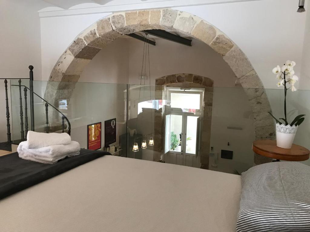 Un pat sau paturi într-o cameră la Casina Trento