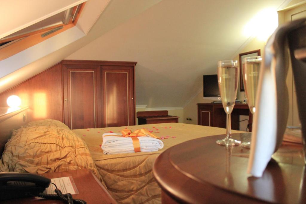 TV a/nebo společenská místnost v ubytování Lion's Hotel