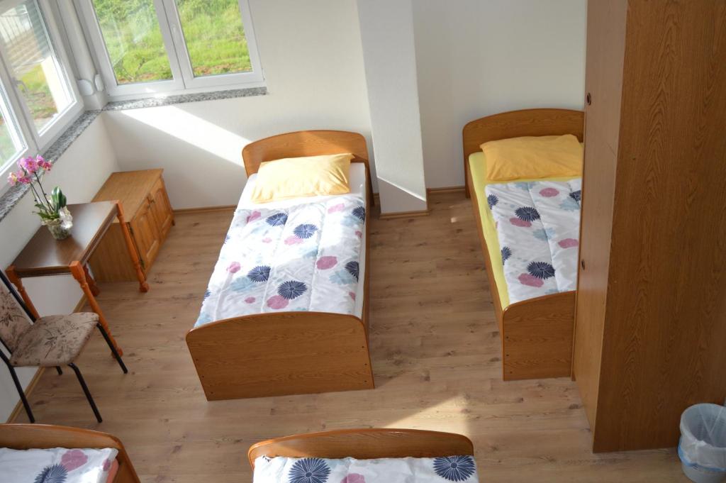 Postel nebo postele na pokoji v ubytování Pansion Modana Medjugorje