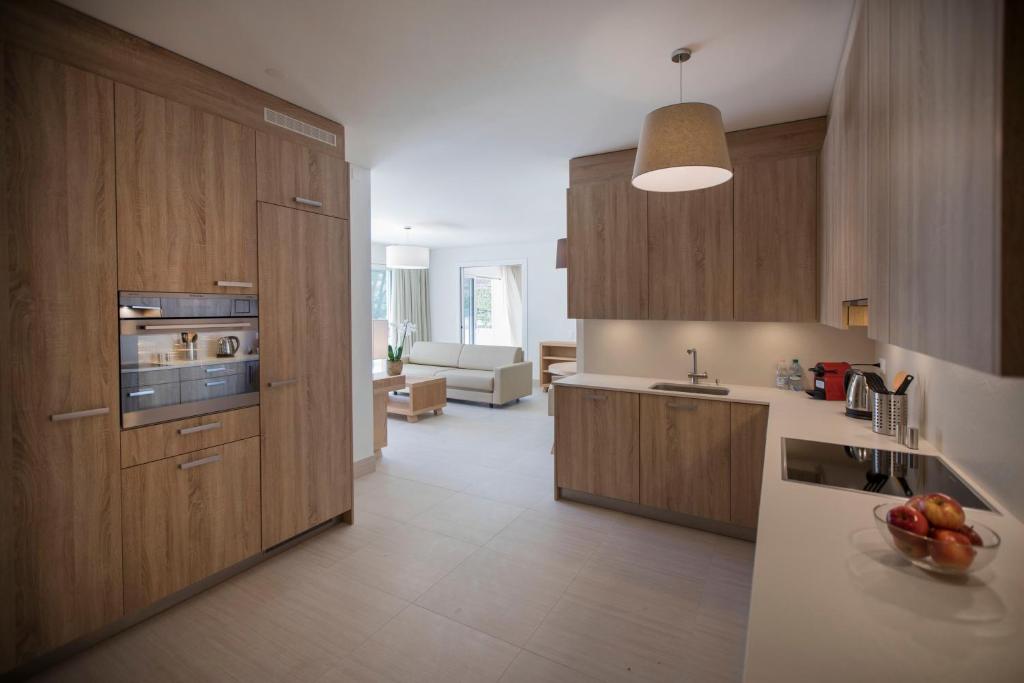Kuchyň nebo kuchyňský kout v ubytování Delta Resort Apartments