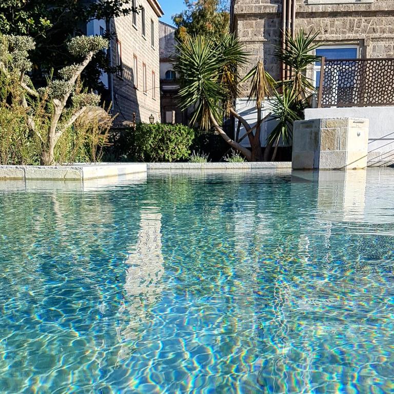 Bazén v ubytování Artis Domus Relais & Spa nebo v jeho okolí