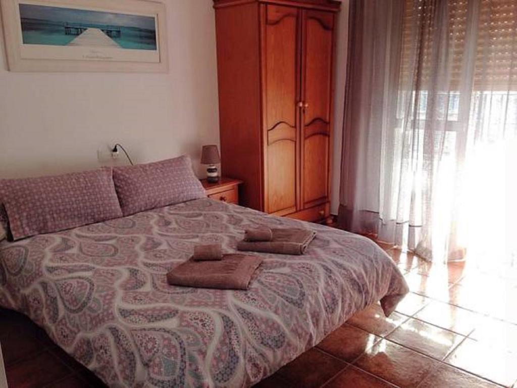 Ліжко або ліжка в номері Hostal Puerto de Santa Maria