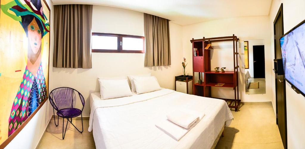 Postel nebo postele na pokoji v ubytování Xilo Design Hotel