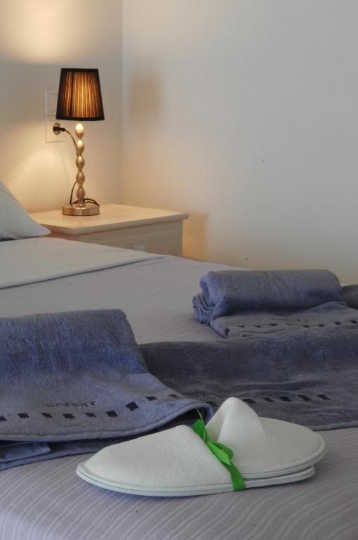 Cama ou camas em um quarto em Lino Apartments