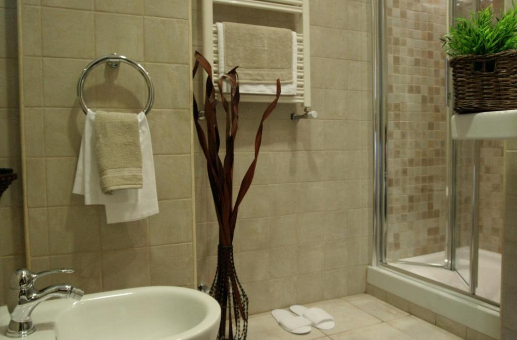 Łazienka w obiekcie Hotel Latinum