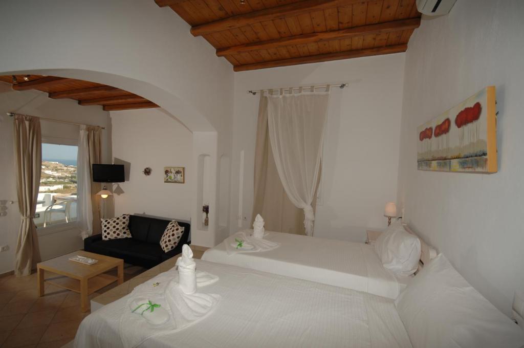 Cama ou camas em um quarto em Lino Apartments