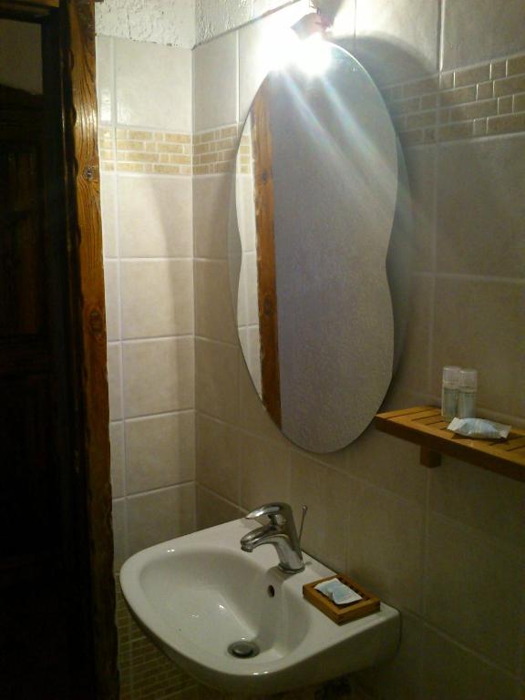 Koupelna v ubytování Hotel Polydrosos