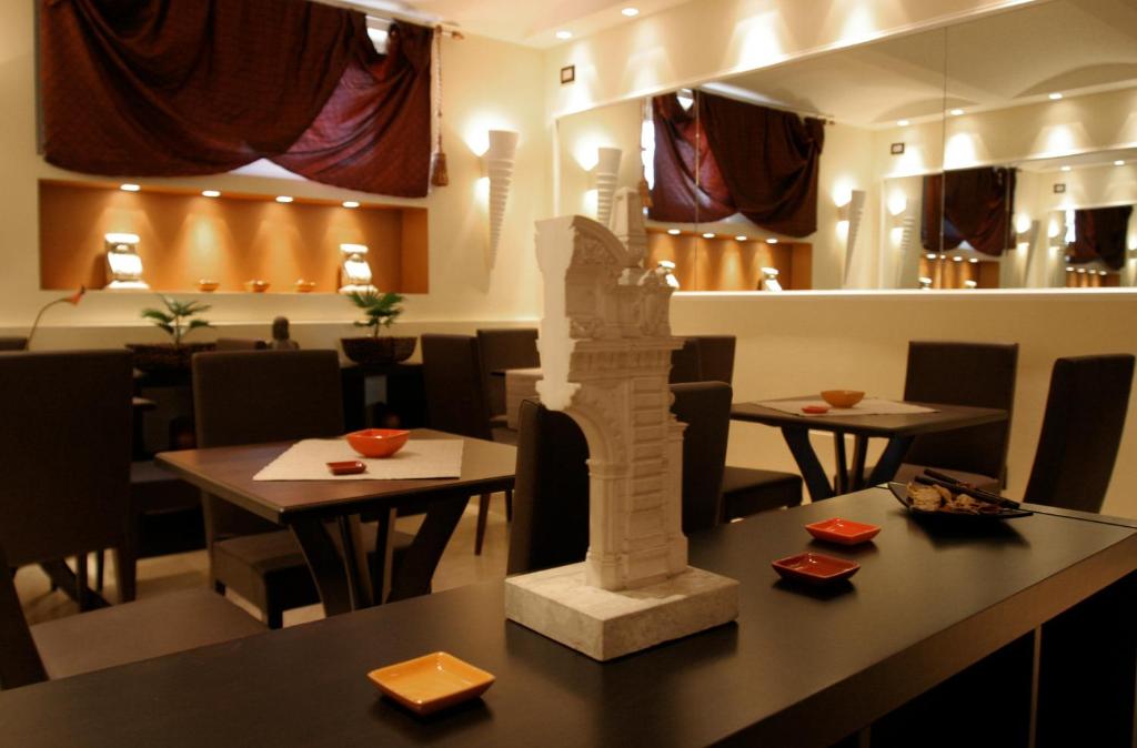 Restauracja lub miejsce do jedzenia w obiekcie Hotel Latinum