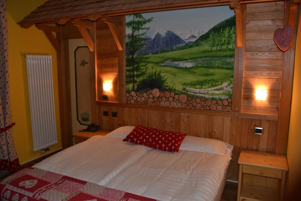Postel nebo postele na pokoji v ubytování Hotel Cova