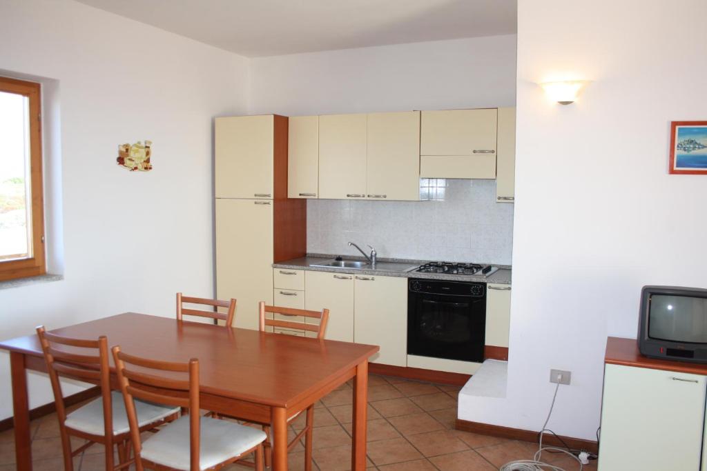 Kuchyň nebo kuchyňský kout v ubytování Appartamenti Ideal