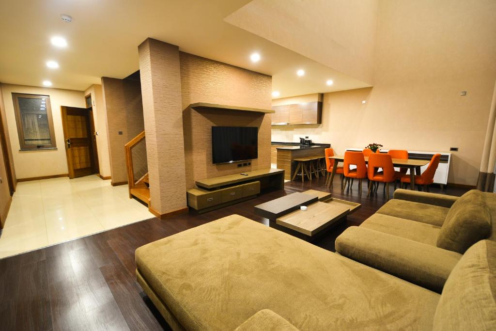 Speke Apartments Wampewoにあるテレビまたはエンターテインメントセンター