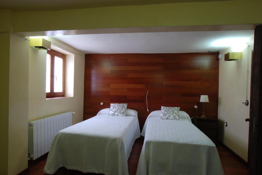 Cama o camas de una habitación en Alojamientos Rurales los Albardinales