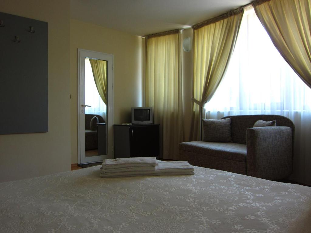 Postel nebo postele na pokoji v ubytování Family Hotel Bistritsa