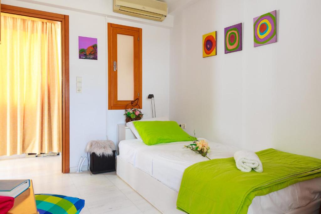 Posteľ alebo postele v izbe v ubytovaní Ierapetra Seaview