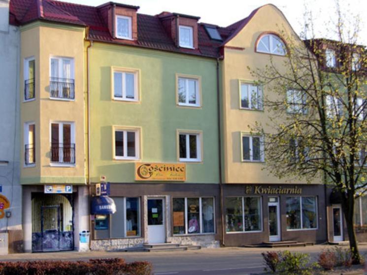 a large building on the corner of a street at Gościniec Pan Tadeusz in Giżycko