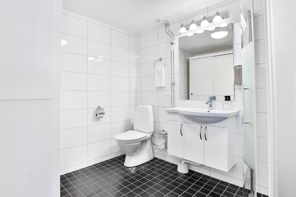 Koupelna v ubytování Hotel Poseidon