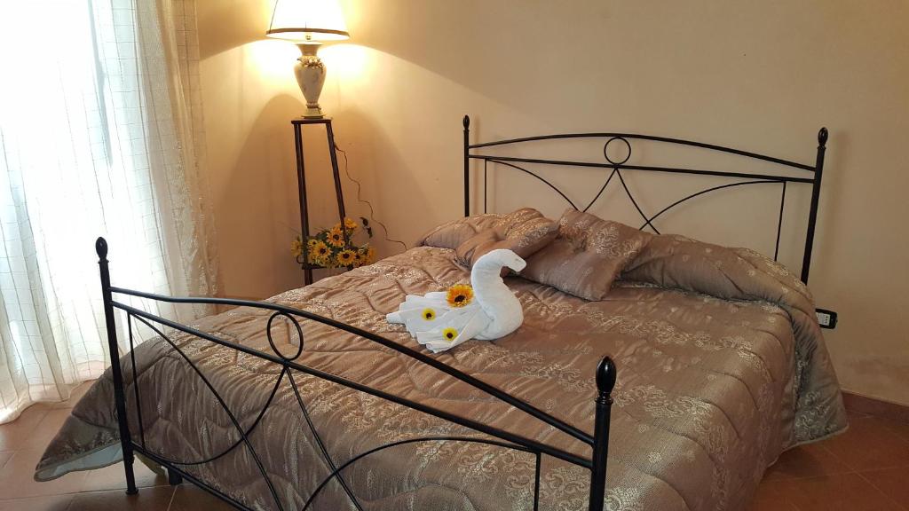 Uma cama ou camas num quarto em Casa Vacanza Porta Nuova