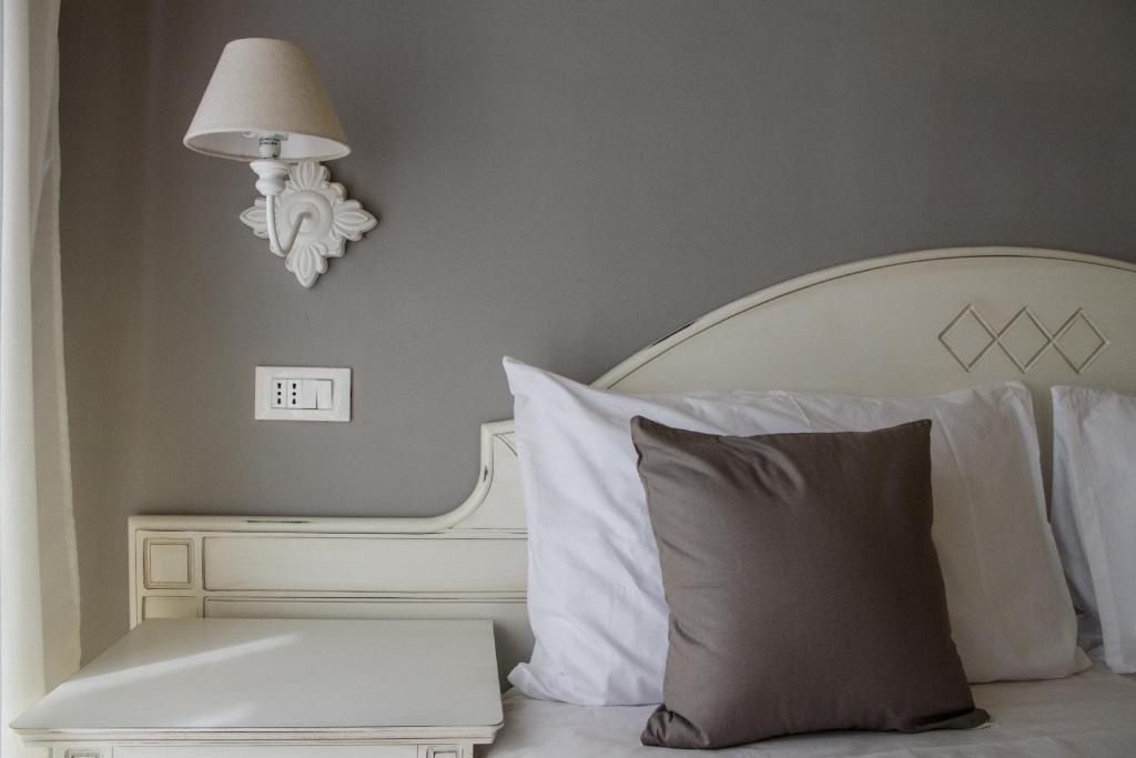 Кровать или кровати в номере Guest House Domo Florenzia