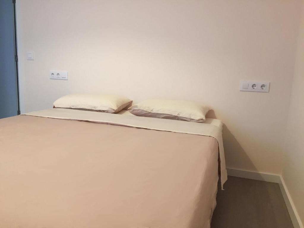 Posteľ alebo postele v izbe v ubytovaní Apartment Victor
