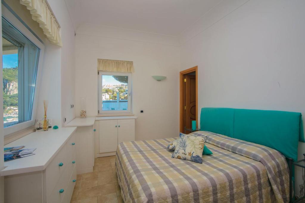 Voodi või voodid majutusasutuse B&B Punta Vivara toas