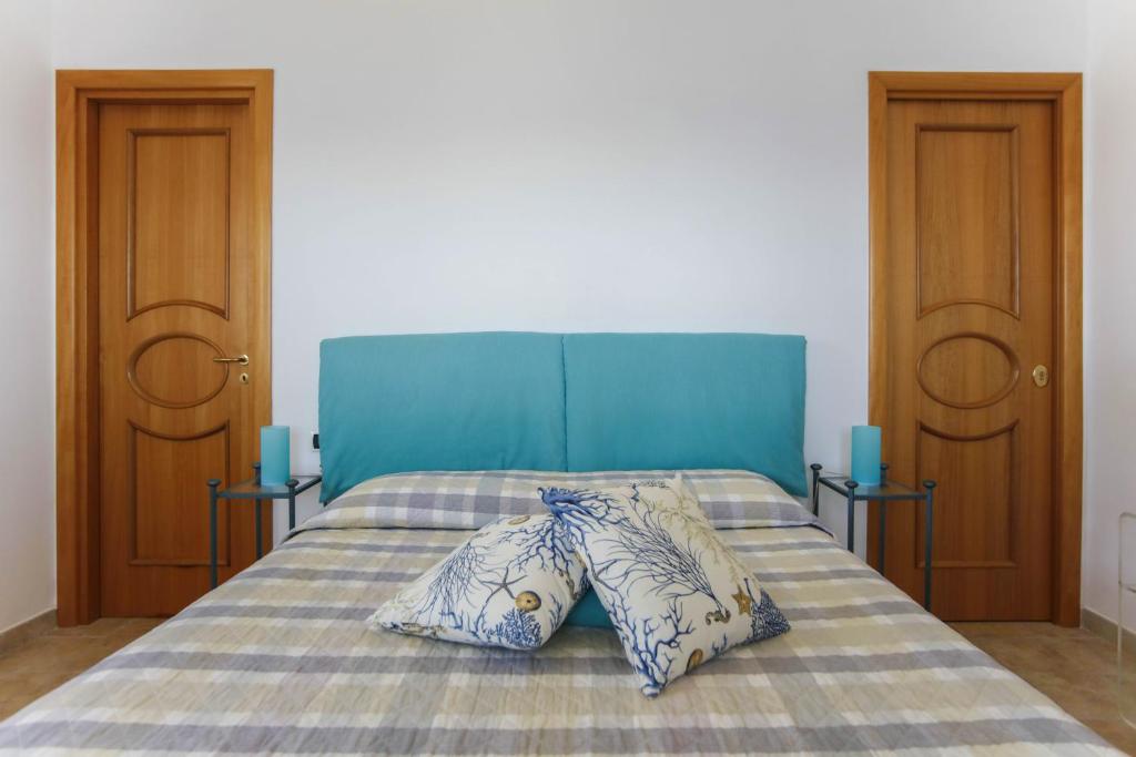 Voodi või voodid majutusasutuse B&B Punta Vivara toas