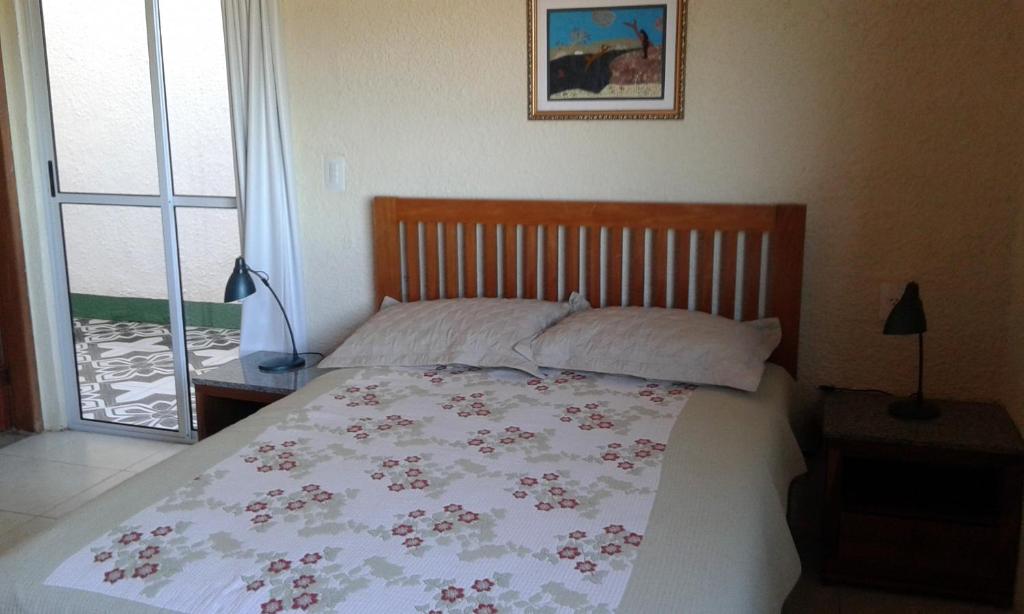 Postel nebo postele na pokoji v ubytování Tapuio Park Hotel