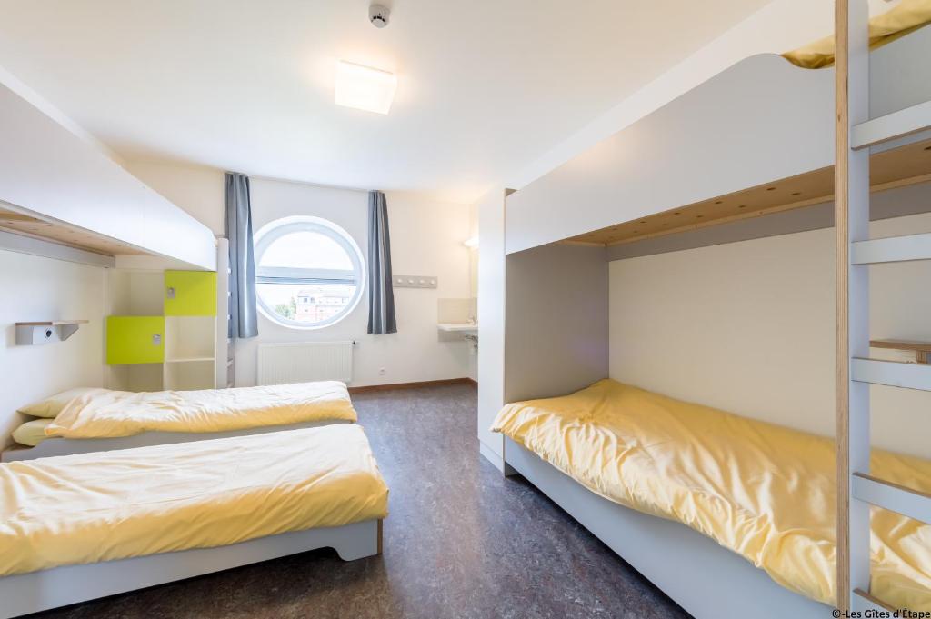 Postel nebo postele na pokoji v ubytování Gîte Kaleo Eupen Jugendherberge