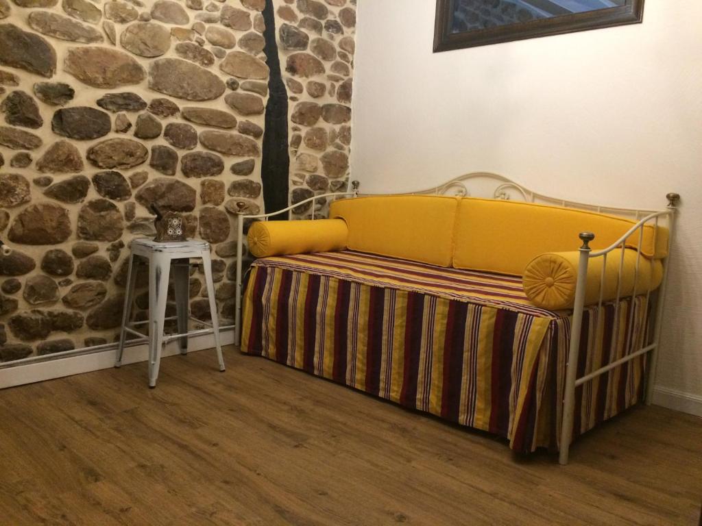 Postel nebo postele na pokoji v ubytování Posada Real La Montañesa