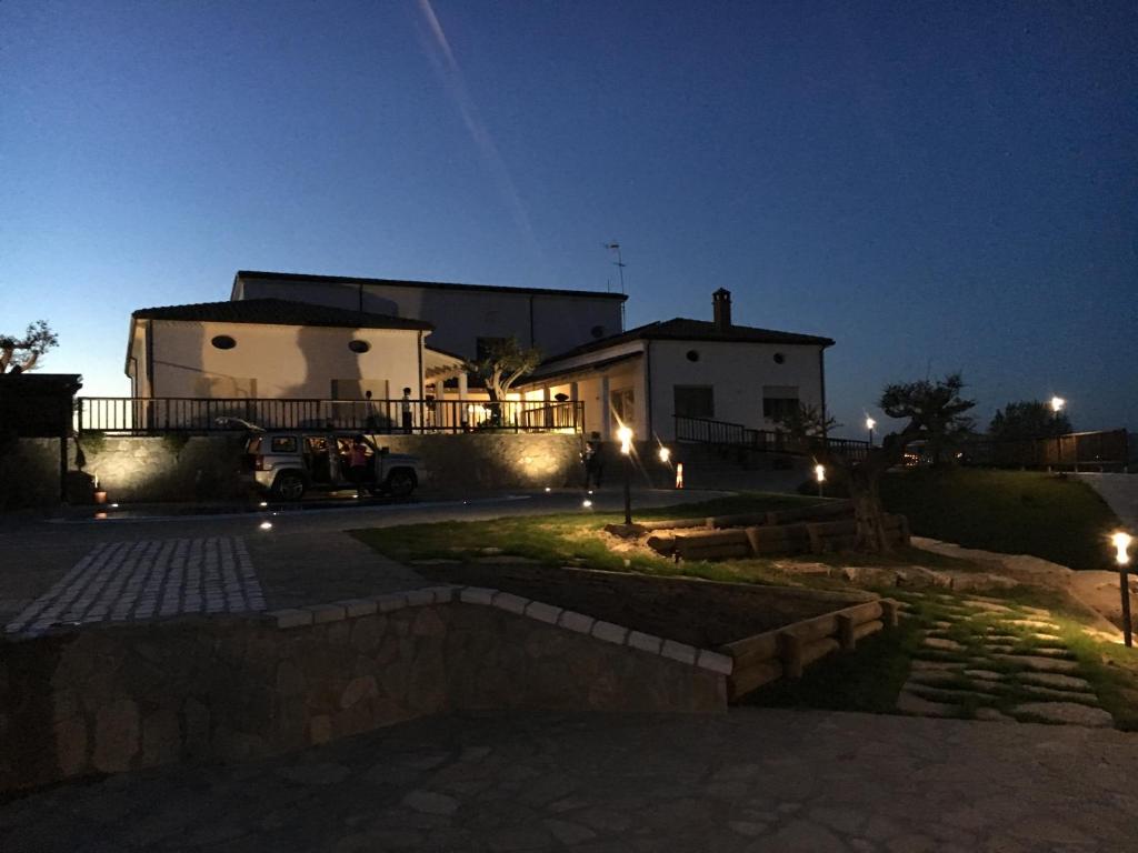 a house at night with lights in front of it at Villa Santoro in Ariano Irpino