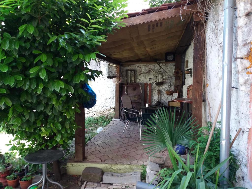 an outside view of a house with a patio at Apartment&Rooms "Globus" Mostar in Mostar