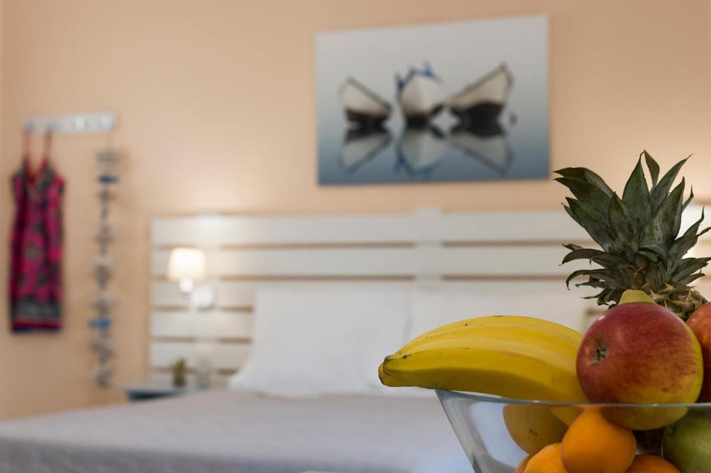 Postel nebo postele na pokoji v ubytování Letta's Apartments