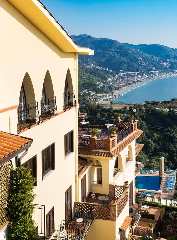 a view from the side of a building with balconies at Hotel Sirius in Taormina