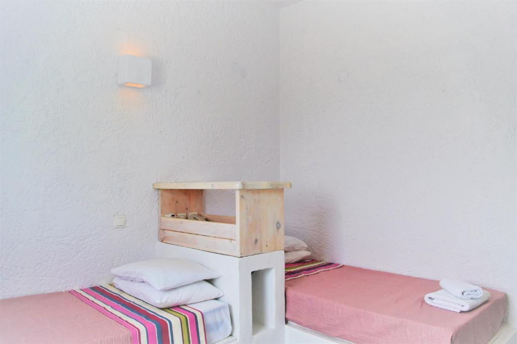 Postel nebo postele na pokoji v ubytování Hotel Irini