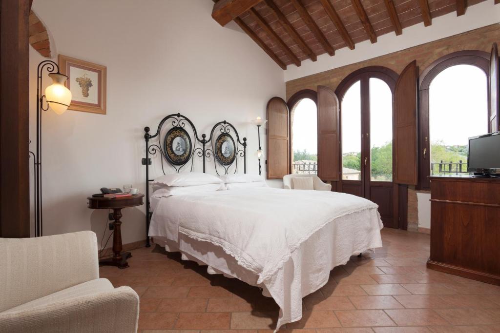 Postel nebo postele na pokoji v ubytování Agriturismo La Collina