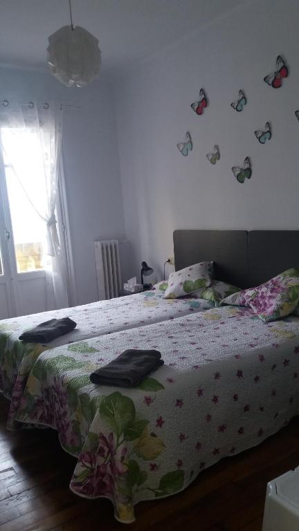 Posteľ alebo postele v izbe v ubytovaní Pensión Tu Hogar