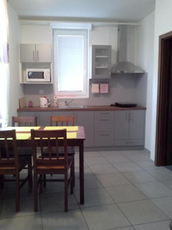 Kuchyň nebo kuchyňský kout v ubytování Alegria Natur Apartments